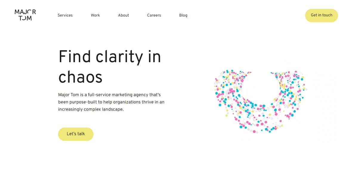 Major Tom marketing agency homepage featuring headline Find clarity in chaos and colorful particle graphic.